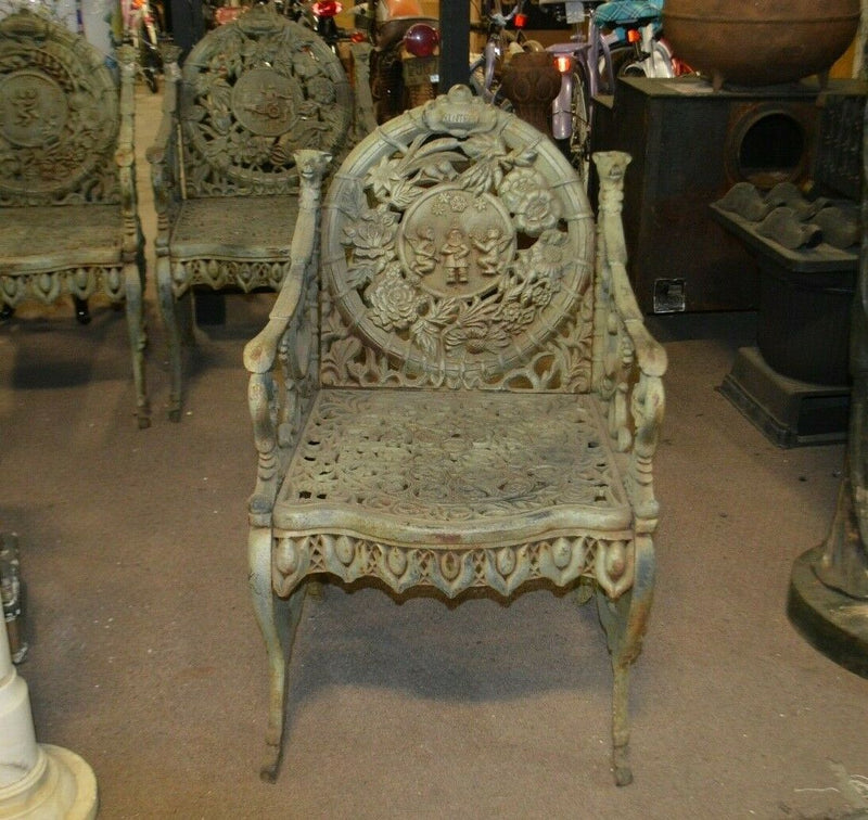 Set of 4 - FOUR SEASONS IRON CHAIR BY NORTHAMPTON, W. ROBERTS, THE LION FOUNDRY
