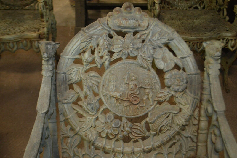 Set of 4 - FOUR SEASONS IRON CHAIR BY NORTHAMPTON, W. ROBERTS, THE LION FOUNDRY